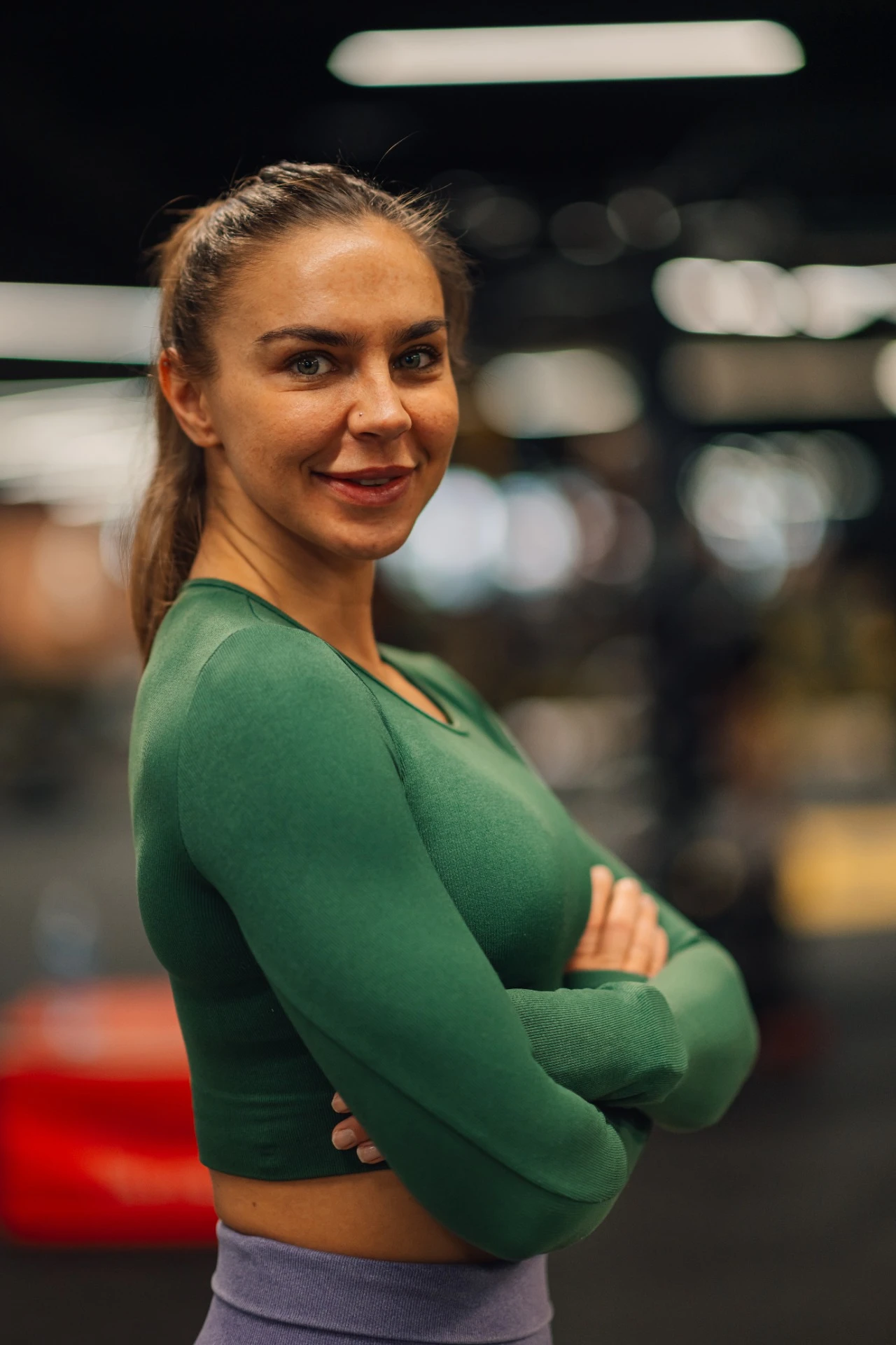 Confident fitness instructor representing professional fitness education